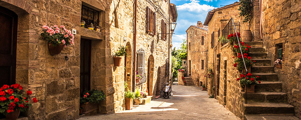 Alleyway of a stone village in Tuscany