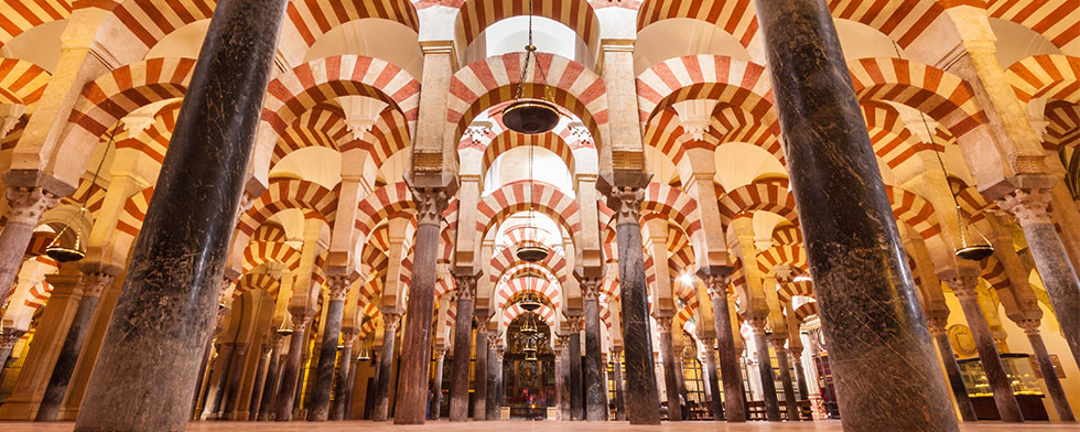 Red-and-white-striped arches in the Historic Center of Cordoba, Spain