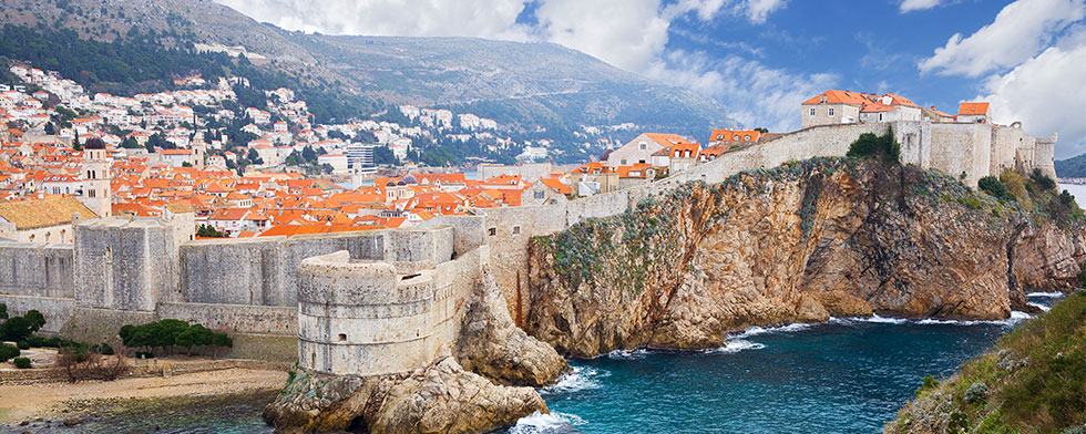 White walls and red-tiled roofs along Dubrovnik's coast