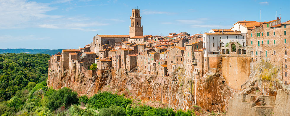 Tuscan village atop red cliffs